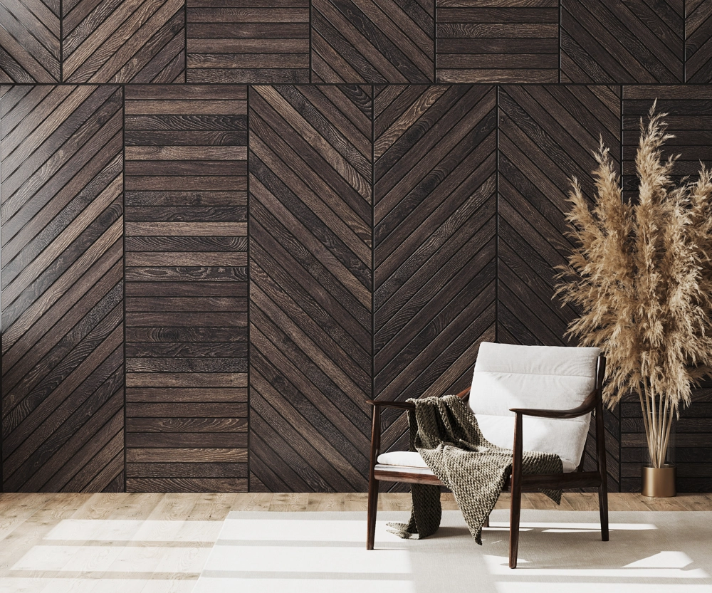 Eleganter Sessel vor dunklen dekorativen Holzpaneelen an der Wand mit Pampasgras – Dekorative Wandpaneele